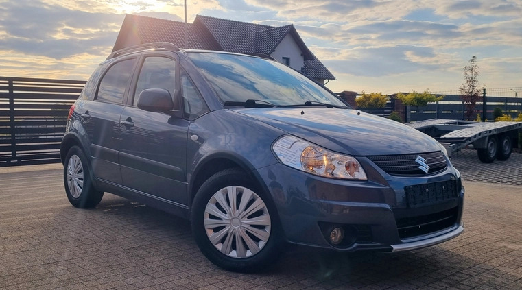Suzuki SX4 cena 24900 przebieg: 152000, rok produkcji 2009 z Tuchola małe 407